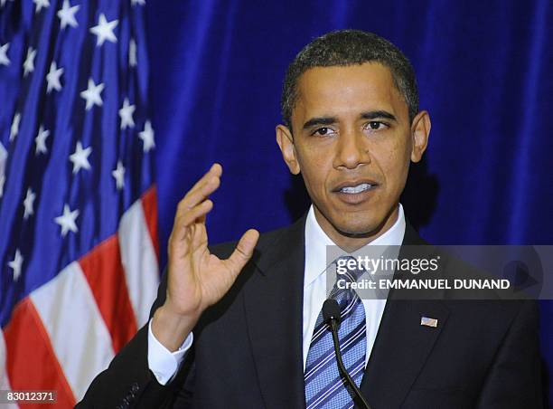 Democratic presidential candidate Illinois Senator Barack Obama addresses a press conference on September 25, 2008 in Washington, DC following a...