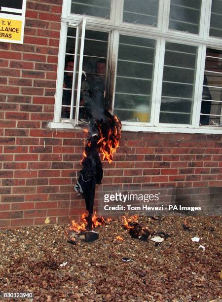Wimbledon's new signing John Hartson's tracksuit is set alight by his new teammates at Roehampton Vale, where he joined the Crazy Gang for his first...