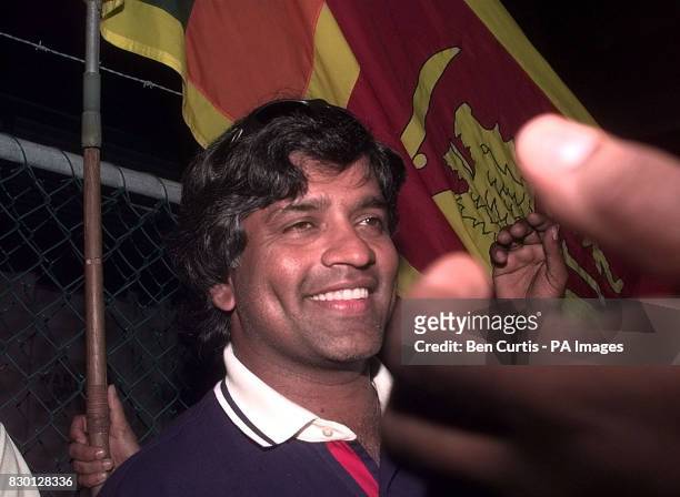 Sri Lankan Captain Arjuna Ranatunga, mobbed by fans, leaves his disciplinary hearing in Perth after receiving a suspended sentence and a fine.