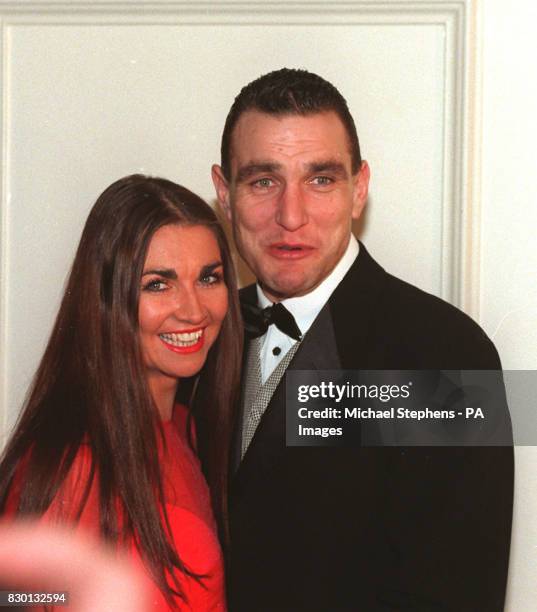 Soccer player turned part time actor Vinnie Jones accompanied by his wife Tanya as they arrive at the Savoy Hotel in London for the Evening Standard...