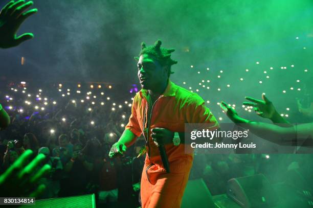 Kodak Black performs on stage at his Homecoming Concert first show since getting home from jail in June at Watsco Center on August 10, 2017 in Coral...