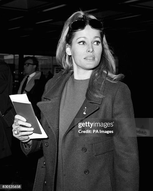 Actress Ursula Andress, at Heathrow Airport, on her way to a South Seas Island after completing work on the James Bond film 'Casino Royale' with...