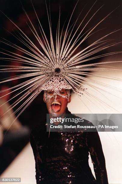 Actress/singer Grace Jones models one of the hat creations by designer Philip Treacy, in London, as part of London Fashion Week.