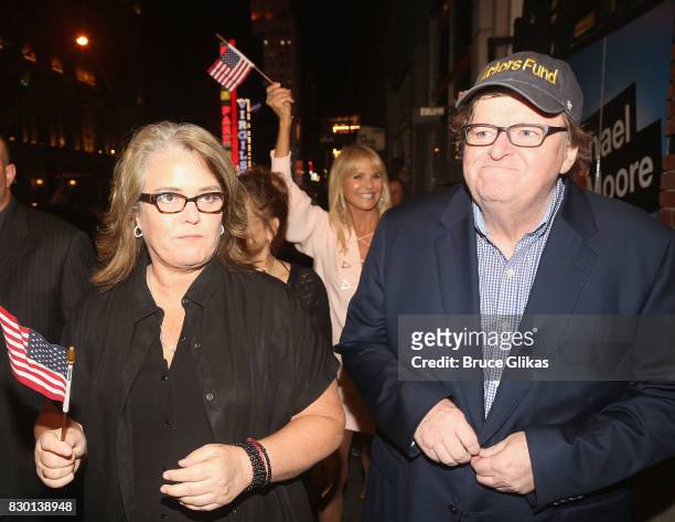 Rosie O'Donnell, Christie Brinkley and Michael Moore walk in a parade of celebration to the opening night party for "Michael Moore: "The Terms Of My...