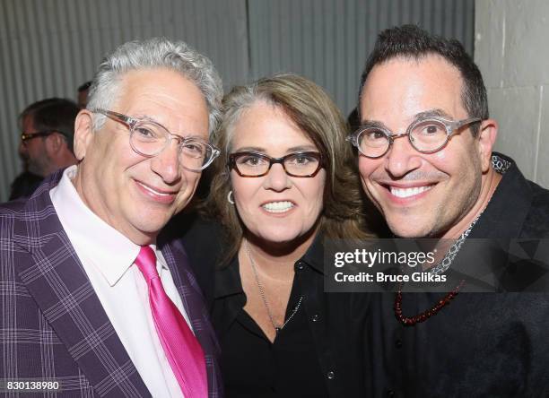 Harvey Fierstein, Rosie O'Donnell and Director Michael Mayer pose backstage at the opening night of "Michael Moore: "The Terms Of My Surrender" on...