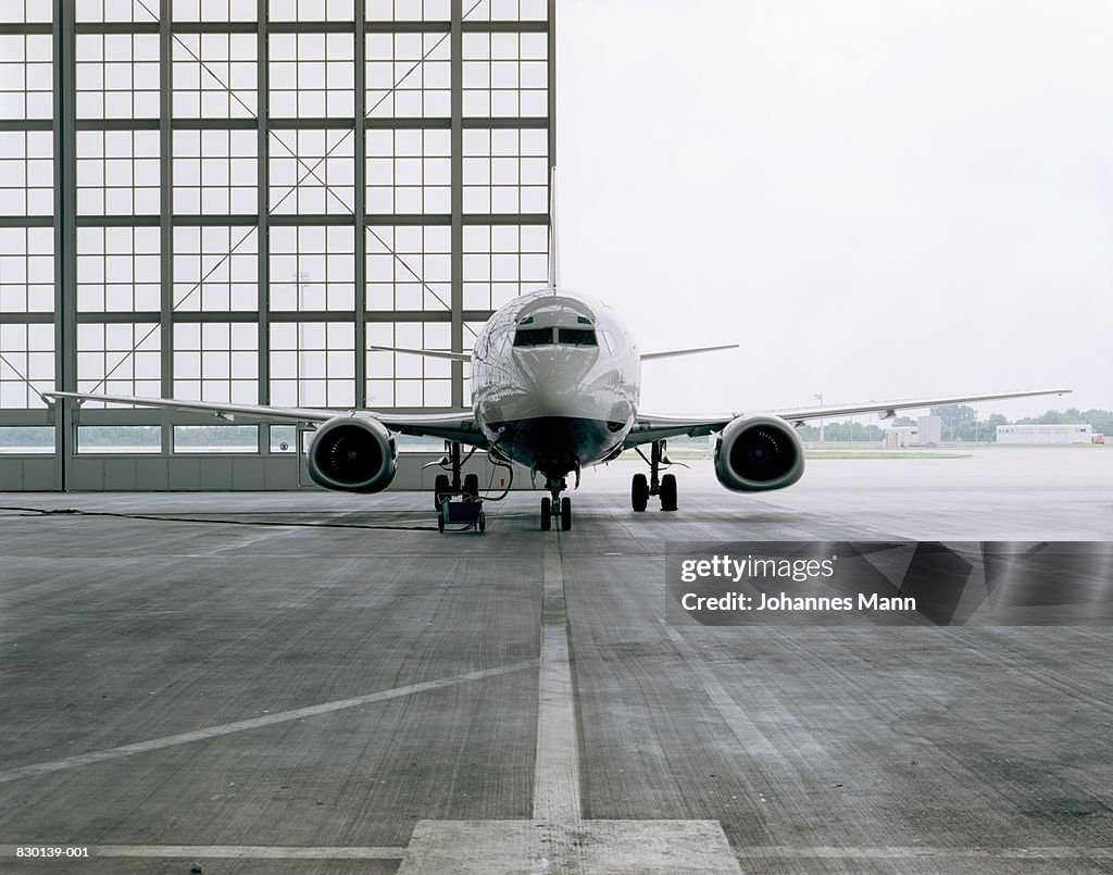 Commercial aircraft in hangar