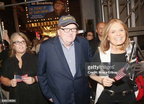 Rosie O'Donnell, Michael Moore and Gloria Steinem walk in a parade of celebration to the opening night party for "Michael Moore: "The Terms Of My...