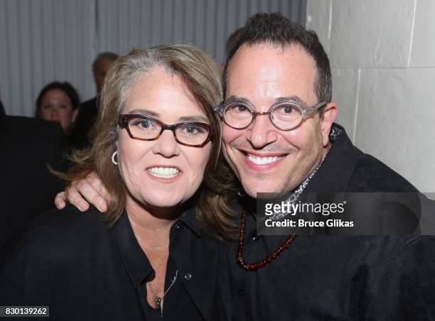Rosie O'Donnell and Director Michael Mayer pose backstage at the opening night of "Michael Moore: "The Terms Of My Surrender" on Broadway at The...