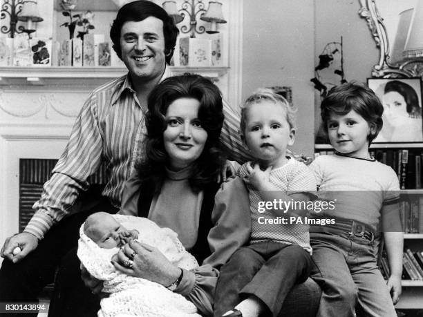 PA NEWS PHOTO 28/9/72 A LIBRARY FILE PICTURE OF TERRY WOGAN AND HIS WIFE HELEN WITH THEIR BABY DAUGHTER KATHERINE AND TWO SONS AGED FIVE AND TWO AT...