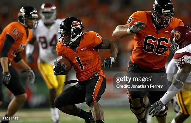 Jacquizz Rodgers of the Oregon State Beavers runs with the ball against the Southern California Trojans at Reser Stadium on September 25, 2008 in...