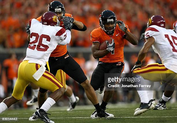 Jacquizz Rodgers of the Oregon State Beavers runs with the ball against the Southern California Trojans at Reser Stadium on September 25, 2008 in...