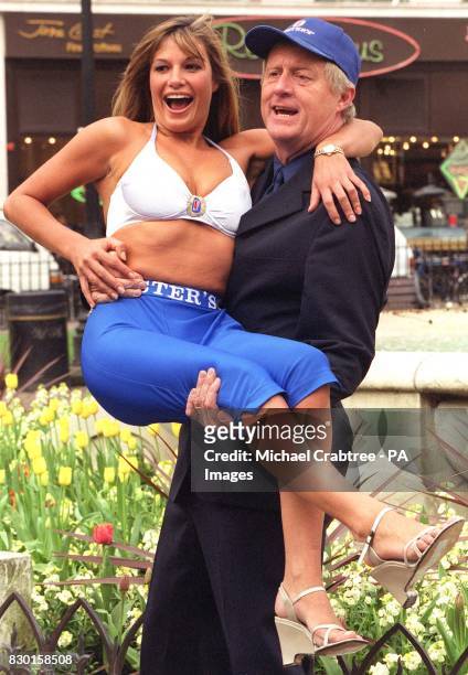 And radio presenter Chris Tarrant with Mimi MacPherson, younger sister of Australian supermodel Elle, for the launch of Fostralia 2000, in London....