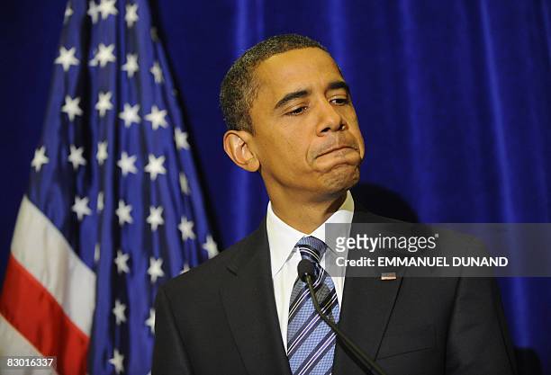 Democratic presidential candidate Illinois Senator Barack Obama addresses a press conference on September 25, 2008 in Washington, DC following a...