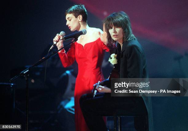 Pretenders singer Chrisse Hynde with Irish singer Sinead O'Connor perform during "Here, There and Everywhere," a charity concert at the Royal Albert...