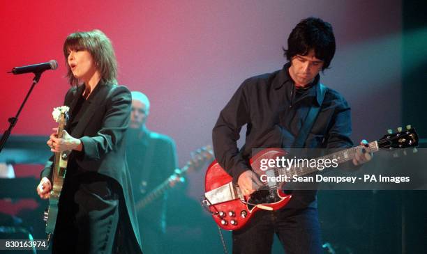 Pretenders singer Chrisse Hynde with former Smiths guitarist Johnny Marr perform during "Here, There and Everywhere," a charity concert at the Royal...