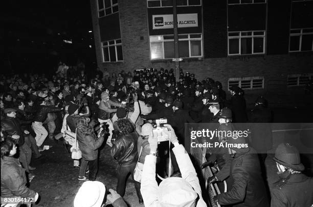 Pickets clash with police during another night vigil outside Rupert Murdoch's News International hi-tech plant in Wapping, London, part of the print...