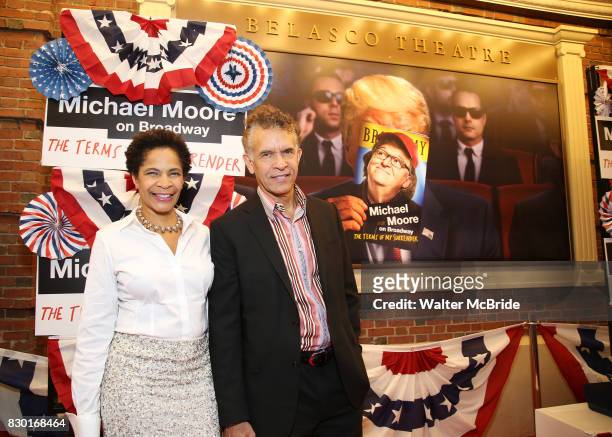Allyson Tucker and Brian Stokes Mitchell attend the Broadway Opening Night Performance for 'Michael Moore on Broadway' at the Belasco Theatre on...