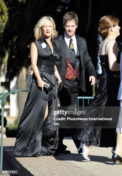 Amber Petty and Richard Reid arrive for the wedding of 2Day FM radio presenter Kyle Sandilands and aspiring pop star Tamara Jaber at St Brigids...