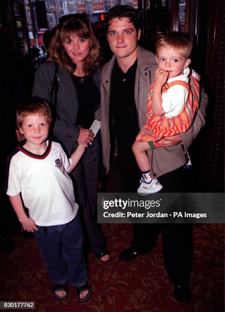 Actress Danniella Morgan , with husband Ben Morgan and son Kai , arrives for the first night of a re-cast 'Beauty and the Beast' musical at the...