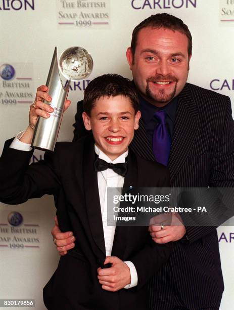 The Fast Show's John Thomson congratulates Kelvin Fletcher, who plays Andy Hopwood in the soap Emmerdale, winning the Best Dramatic Performance...