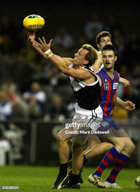 Shaune Moloney of the Roosters marks during the VFL Grand Final match between North Ballarat and Port Melbourne held at the Telstra Dome September...