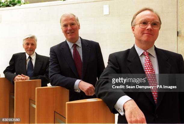 S Chief Executive Sir Peter Bonfield, Chairman Sir Iain Vallance and Finance Director Robert Brace during a photocall at the BT Centre in London, to...