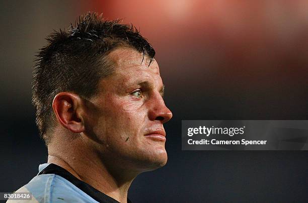 Danny Nutley of the Sharks looks dejected after losing the first NRL Preliminary Final match between the Cronulla Sharks and the Melbourne Storm held...