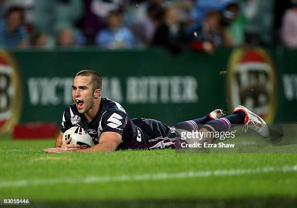 Steve Turner of the Storm dives in for a try during the first NRL Preliminary Final match between the Cronulla Sharks and the Melbourne Storm held at...