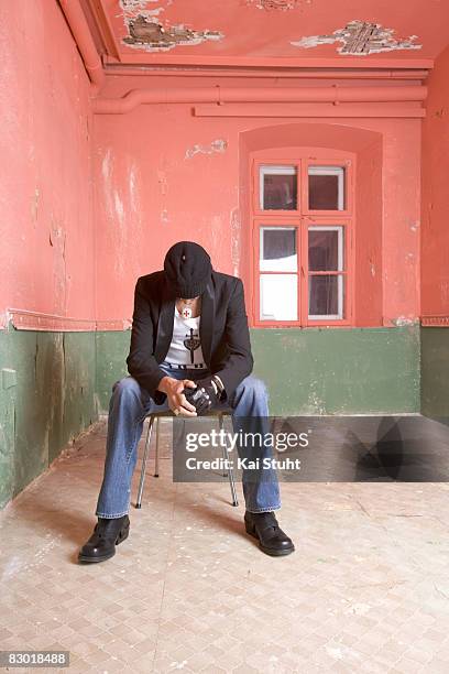 Cyclist Andreas Kloden poses for a portrait shoot for Useless magazine in Munich on March 17, 2004.