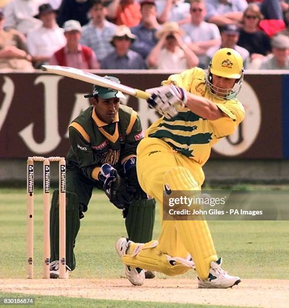 Australian batsman Adam Gilchrist makes some quick runs against Bangladesh in the Cricket World Cup 1999 match at Chester le Street in Durham.