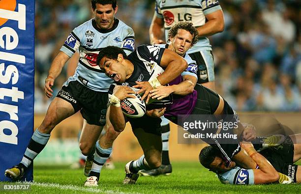 Adam Blair of the Storm reaches out to score a try during the first NRL Preliminary Final match between the Cronulla Sharks and the Melbourne Storm...