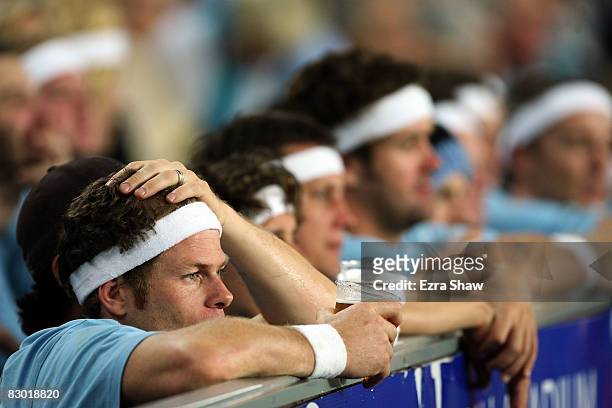 Shark fans watch their team lose during the first NRL Preliminary Final match between the Cronulla Sharks and the Melbourne Storm held at Sydney...
