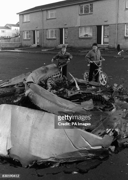 Young children survey wreckage of the PAN AM Boeing 747 jumbo jet which was bombed and crashed on the Scottish town of Lockerbie, near Dumfries, the...