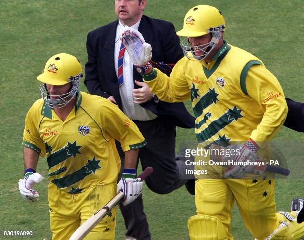 Australian batsmen Steve Waugh and Tom Moody run off to celebrate their win over South Africa, in their Cricket World Cup Super Six match at...