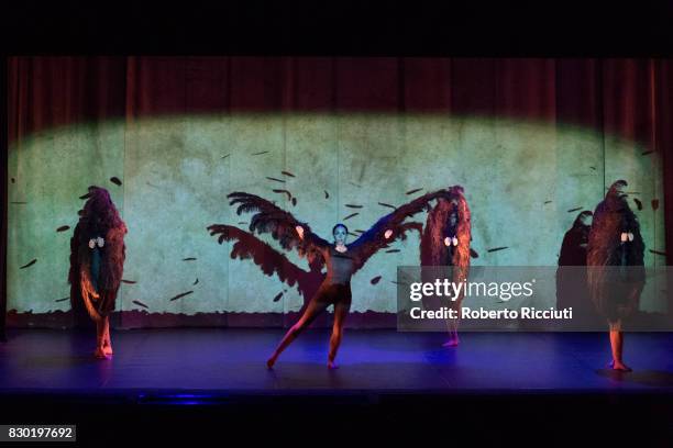Dancers from Spanish dance company Aracaladanza perform on stage during a photocall for the show 'Vuelos' at Church Hill Theatre during the 70th...
