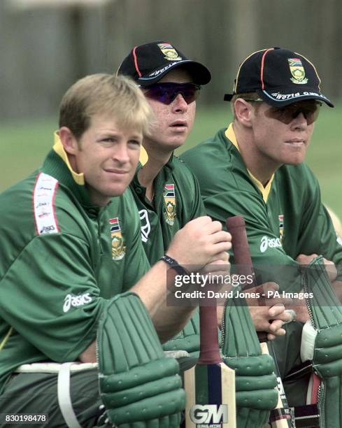 South African cricketers Jonty Rhodes , herschelle Gibbs and Shaun Pollock await their turn in the nets at Edgbastonm, where their team was preparing...