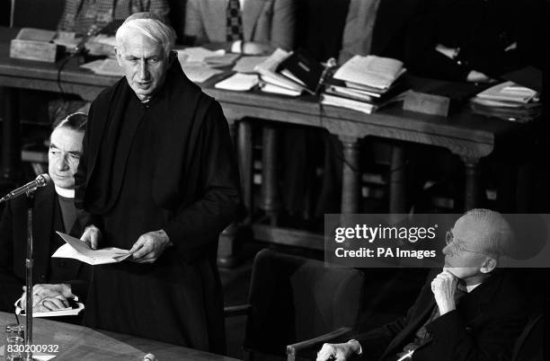 The Archbishop of Canterbury, Dr Donald Coggan watches as Cardinal Basil Hume, the Roman Catholic Archbishop of Westminster addresses the General...