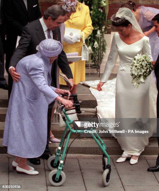 Queen Ingrid of Denmark greets the bride, Princess Alexia of Greece, on the steps of the Greek Orthodox Cathedral of St Sophia in Bayswater, west...