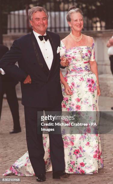 Queen Margarethe and Prince Henrik of Denmark arrive at Bridgewater House in Victoria, London, for a gala ball held two days before the wedding of...