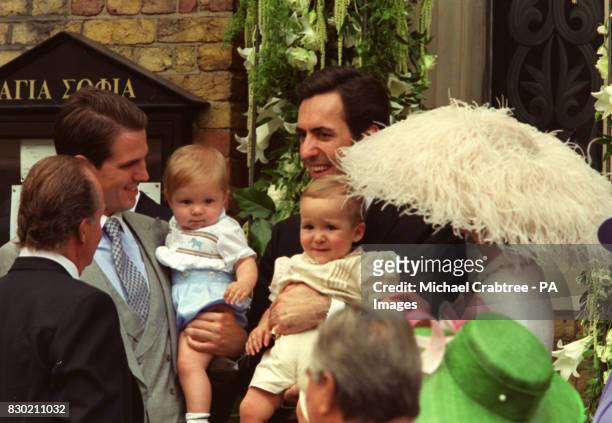 Prince Pavlos with his son Prince Konstantine Alexios, and Jaime de Marichalar and his son Felipe Juan, smile after the wedding of Princess Alexia of...