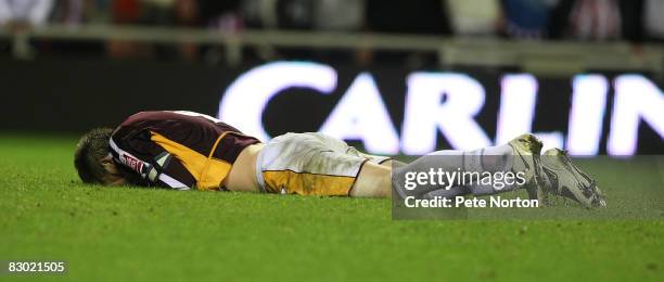 Mark Hughes of Northampton Town in despair after his miss in the penalty shoot out during the Carling Cup Third Round Match between Sunderland and...