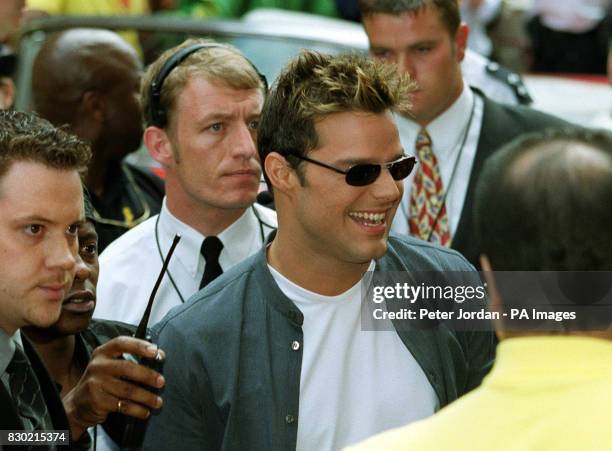 Latin heart throb and pop star Ricky Martin arrives at the Virgin Megastore in Oxford St., amid tight security. Martin is in the country to promote...