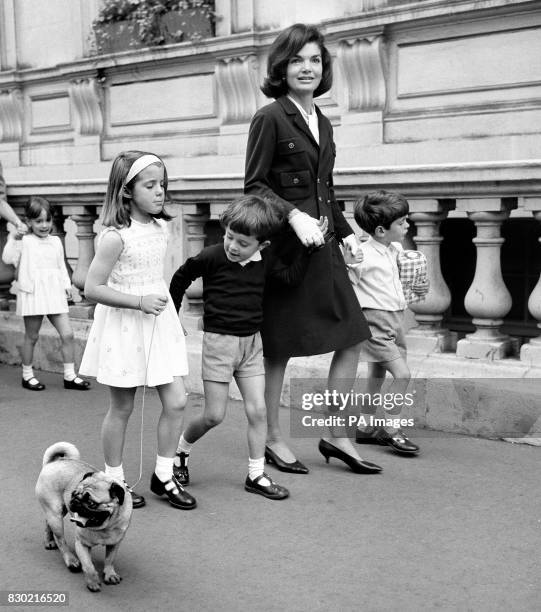 Mrs. Jackie Kennedy, the wife of the late American President John F Kennedy, with her son John Jr and daughter Caroline with their cousin Anthony in...