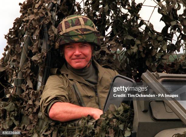 Actor Martin Shaw sits in a camouflaged jeep, at Fairford to help promote NATO's PIT Stop Competition, which will be part of the activites at the...