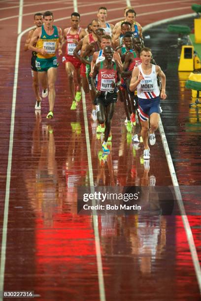 16th IAAF World Championships: Norway Sondre Nordstad Moen in action, leading vs Kenya Cyrus Rutto during Men's 5000M race at Olympic Stadium....