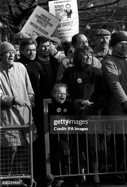 Faces of fury across the age barrier outside Rupert Murdoch's Wapping print works, where protester were attempting to blockade the east London plant.