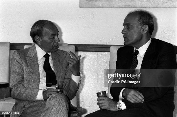 King Hassan of Morocco takes a break for a cup of his mint tea and a cigarette with Professor Magdi Yacoub at Harefield Hospital during his four-day...