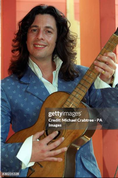 Interior designer and TV presenter Laurence Llewelyn-Bowen poses for the media during a photocall at the Laura Ashley store in London's Regent...