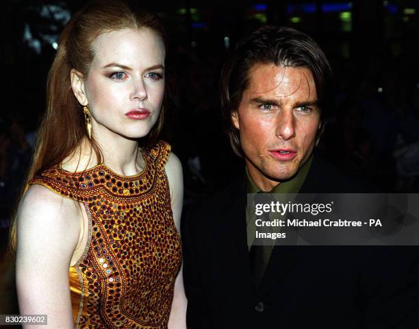 Husband and wife, American actor Tom Cruise and Austrailian actress Nicole Kidman, before the UK premiere of their new film "Eyes Wide Shut" directed...