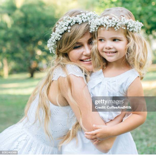 photo of happy mother and her little daughter - summer hair care stock pictures, royalty-free photos & images